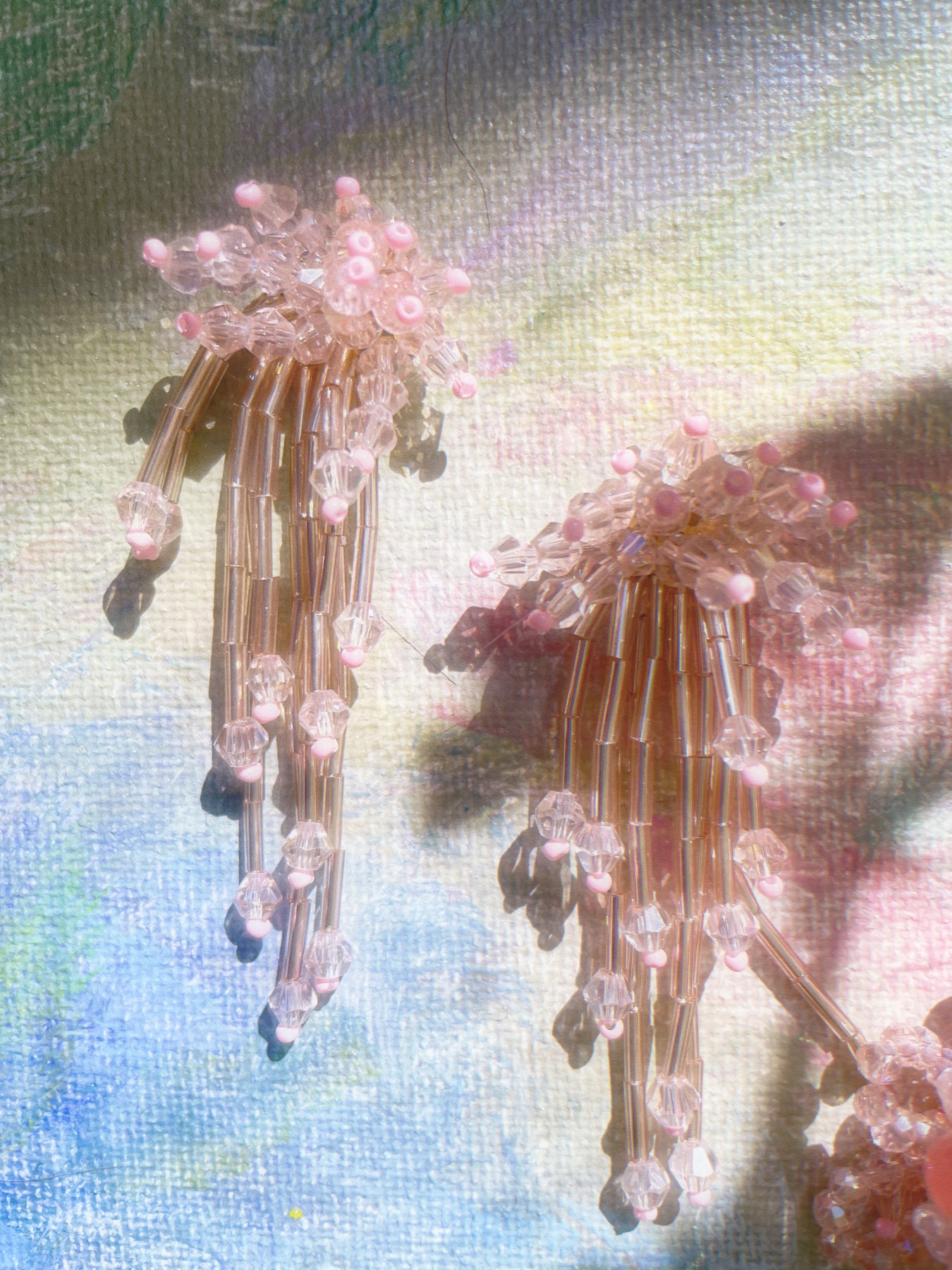 Pink flower earrings with long beaded tassels
