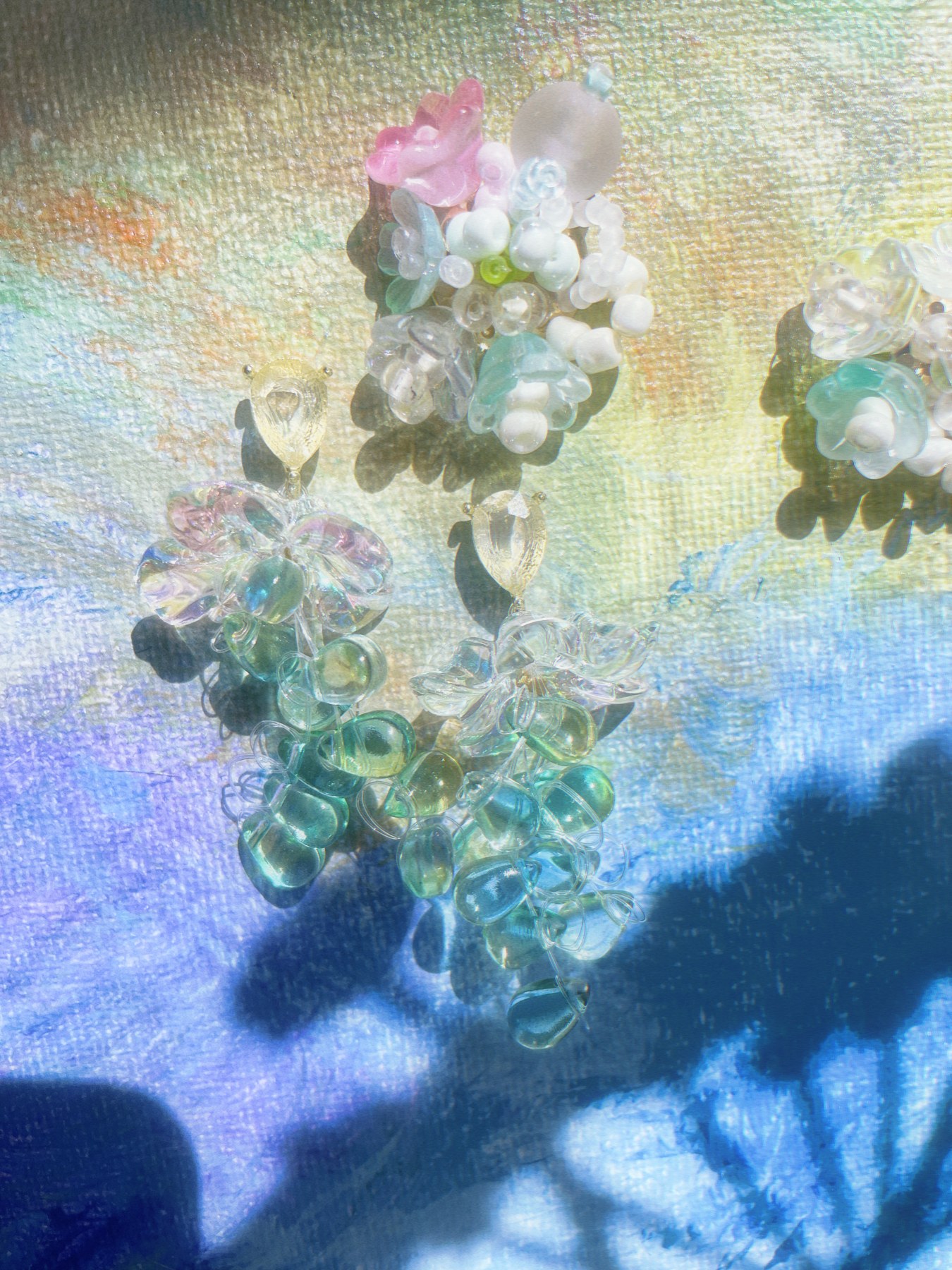 Pastel flower earrings with flowing green and blue beads