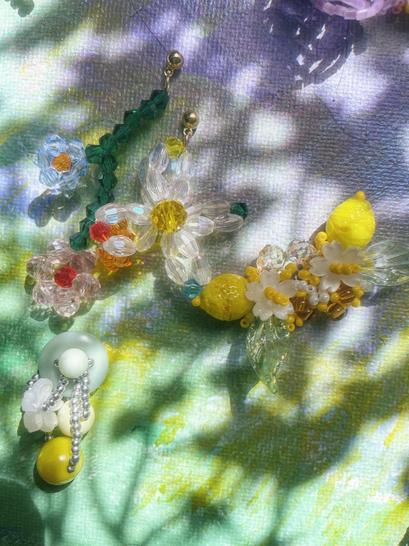 White daisy earrings with colorful beads
